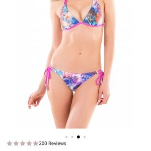 Bikini top and bottom. Originally over $140 for suit. Never worn.